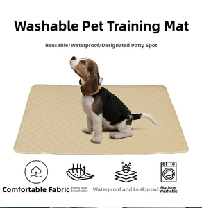 Washable pet pad with hexagonal quilting and non-slip texture showing beagle puppy