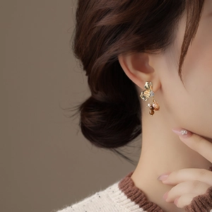 French style gold butterfly earrings with zircon petals and brown tiger eye stone beads