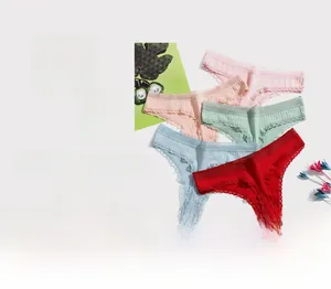 Detail showing five pairs of colorful ribbed cotton thongs with delicate lace trim edges