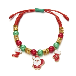 Christmas themed woven bracelet with Santa Claus and stocking charms on red rope