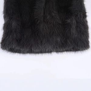 Chic black faux fur cropped coat with soft plush texture and long hair finish