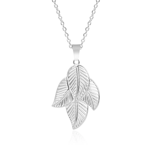 Macro shot of silver triple leaf pendant necklace in 18k vacuum plated stainless steel