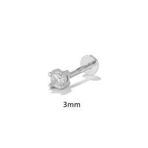 Macro view of 3mm four-prong silver cartilage stud with clear cubic zirconia stone