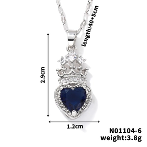 Detail showing blue heart crown pendant dimensions 2.9cm by 1.2cm on silver chain