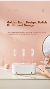 Detailed view of 3-compartment cosmetic organizer with gold legs and striped texture