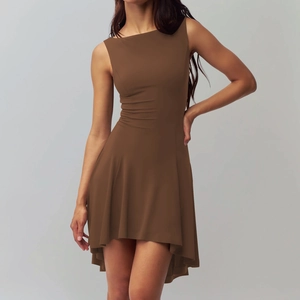 Detail of coffee brown sleeveless dress with slim fit and asymmetric hemline