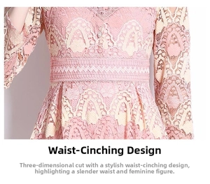 Gros plan d'une robe en dentelle rose avec broderie florale et taille haute ajustée