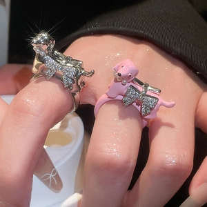 Detail of dachshund puppy ring with pink enamel, sparkling crystals and micro pearls