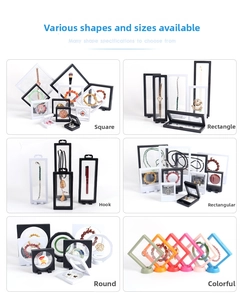 Macro detail of various plastic PE film suspension display boxes in multiple colors and sizes