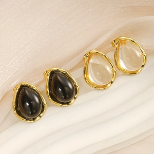 French chic drop-shaped resin stud earrings in transparent and dark grey with gold trim
