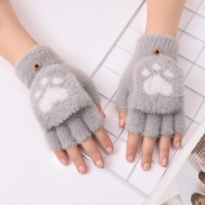 Detailed view of gray plush fingerless gloves featuring a white paw print flip cover design