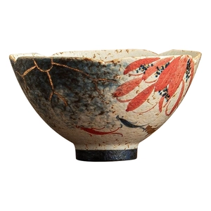 Handcrafted ceramic tea cup with blue floral koi patterns and gold hand-painted details