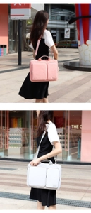 Dual front pockets and detachable shoulder strap on waterproof laptop briefcase