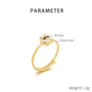 Detail of adjustable gold ring featuring a sparkling cat paw motif with rhinestones