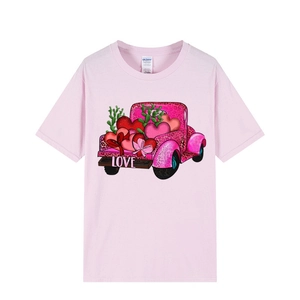 Pink cotton crewneck T-shirt with a heart-filled truck print and Love typography