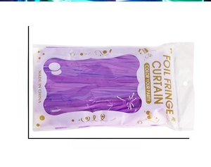 Macro detail of purple foil fringe curtain packaging with precise size measurements