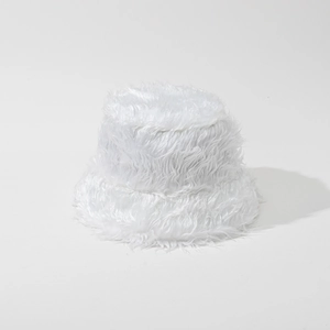 Close-up of white plush faux fur bucket hat showing soft texture and fluffy long hair