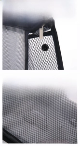Detail of leak-proof snap closure and waterproof mesh fabric on black toiletry bag