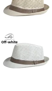 Detail showing breathable straw fedora texture and striped ribbon band for summer
