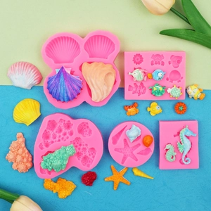 Macro detail of ocean themed silicone molds showing sea shells and starfish textures