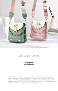 Detail of heart quilted flap bags with gold swan ornaments and pearl tassel accents