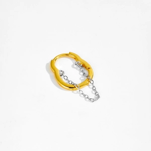Close-up of gold hoop earrings with delicate silver chain tassel drop on white background