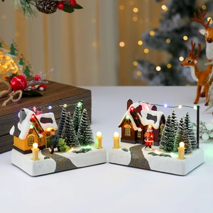 Lighted Christmas village resin music box with snowy houses and colorful LED trees