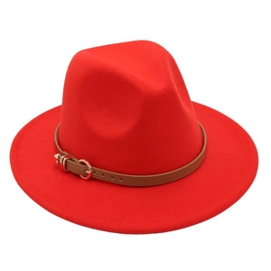 Close-up of red wool fedora hat with a brown leather decorative belt and metal buckle