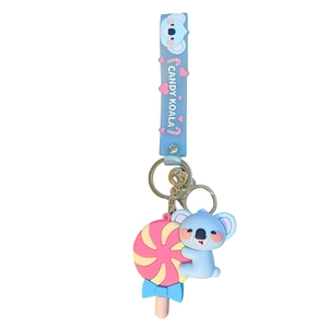 Porte-clés koala bleu mignon en PVC avec breloque sucette et dragonne en silicone assortie