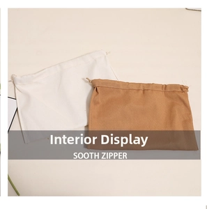 Detail view of cotton drawstring inner bags in beige and coffee brown for beach bags