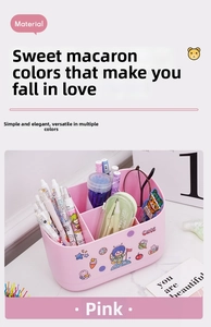 Pink multi-compartment desk organizer with cute stickers for school stationery
