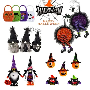 Assorted Halloween party decorations including witch legs, gnomes, and pumpkin bags
