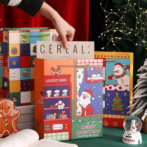 Charming Christmas gift bag with Santa and snowman patterns and sturdy gold handles
