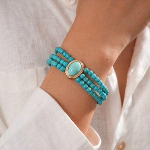 Three-layer bohemian turquoise beaded bracelet with vintage gold oval stone centerpiece