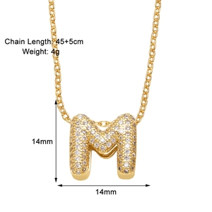 Detail showing letter M pendant size 14mm and 45cm gold chain weight specifications