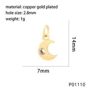 Detail showing gold-plated brass moon pendant with cubic zirconia and dimension labels