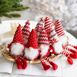 Handcrafted Christmas plush gnomes set in a festive tray with a warm holiday atmosphere