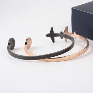Travel the world aircraft map cuff bracelet set in black and rose gold stainless steel