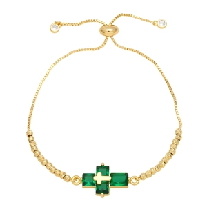 Adjustable golden bolo bracelet featuring green rectangle stones in a cross design