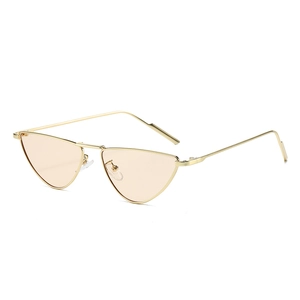 Minimalist gold metal cat-eye sunglasses with light brown lenses in a trendy sharp design