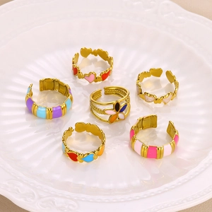 Set of 6 adjustable 18K gold plated enamel rings with heart and flower patterns