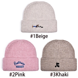 Three knit beanies with dog embroidery in beige, pink and khaki for autumn and winter