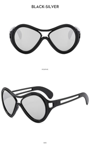 Front and side views of stylish black and silver oversized sunglasses with sleek frames