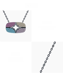 Macro détaillée d'un pendentif étoile en argent 925 avec zircons cubiques colorés 5A