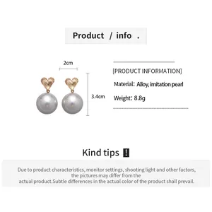 Size chart for heart faux pearl drop earrings showing dimensions 2cm by 3.4cm and alloy material