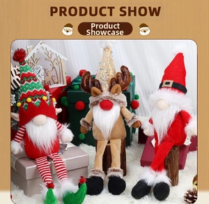 Three Christmas plush dolls including Santa and Reindeer sitting on festive wood stumps