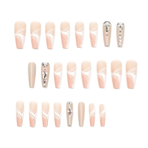Nude pink long ballerina press-on nails with white geometric lines and rhinestones