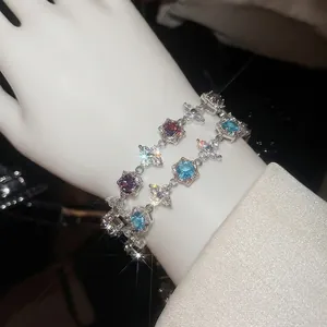 Exquisite silver bracelets featuring purple and blue zircon flowers with sparkling starburst effect