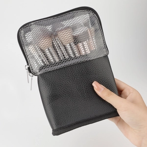 Vertical makeup brush travel case with dual zippers and mesh window for easy storage
