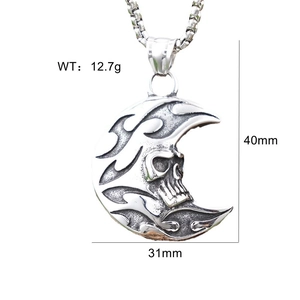 Detail view of punk crescent moon and skull pendant showing dimensions 40mm by 31mm and weight